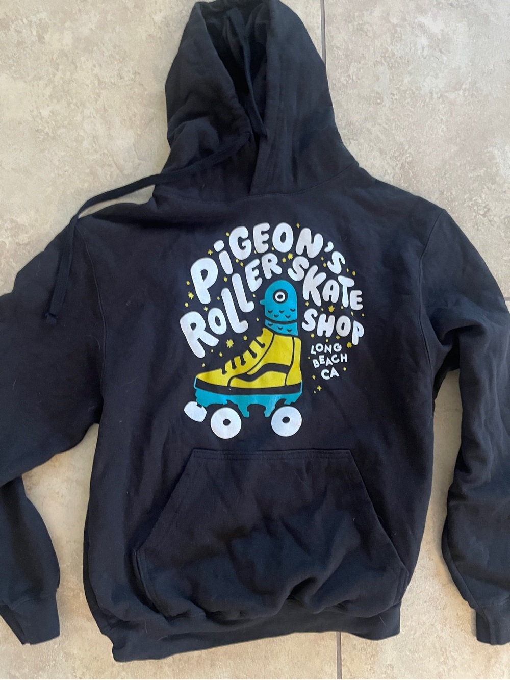Pigeon’s roller skate shop Long Beach California black hoody